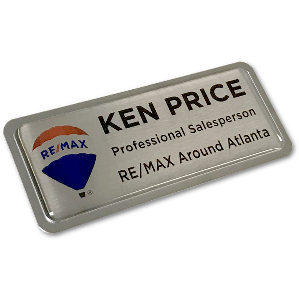RE/MAX Reflector Badge
